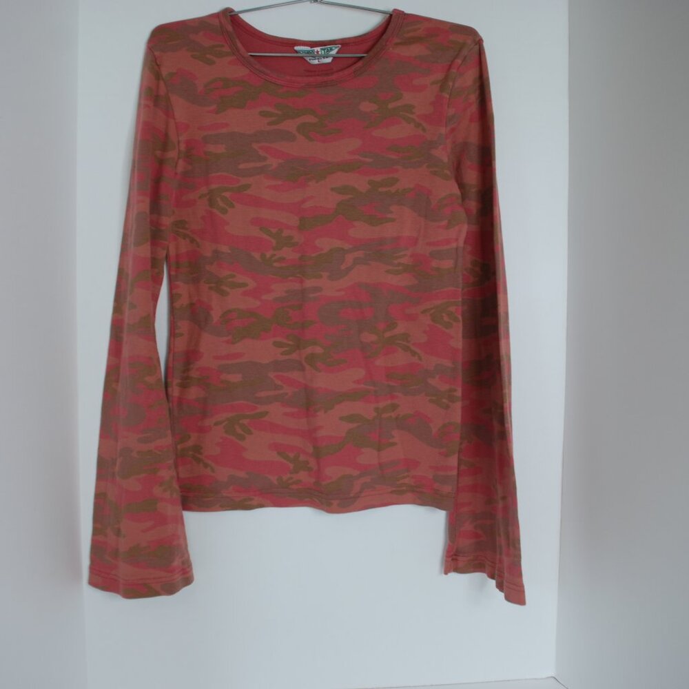 long-sleeved shirt featuring a camouflage pattern in shades of pink and brown